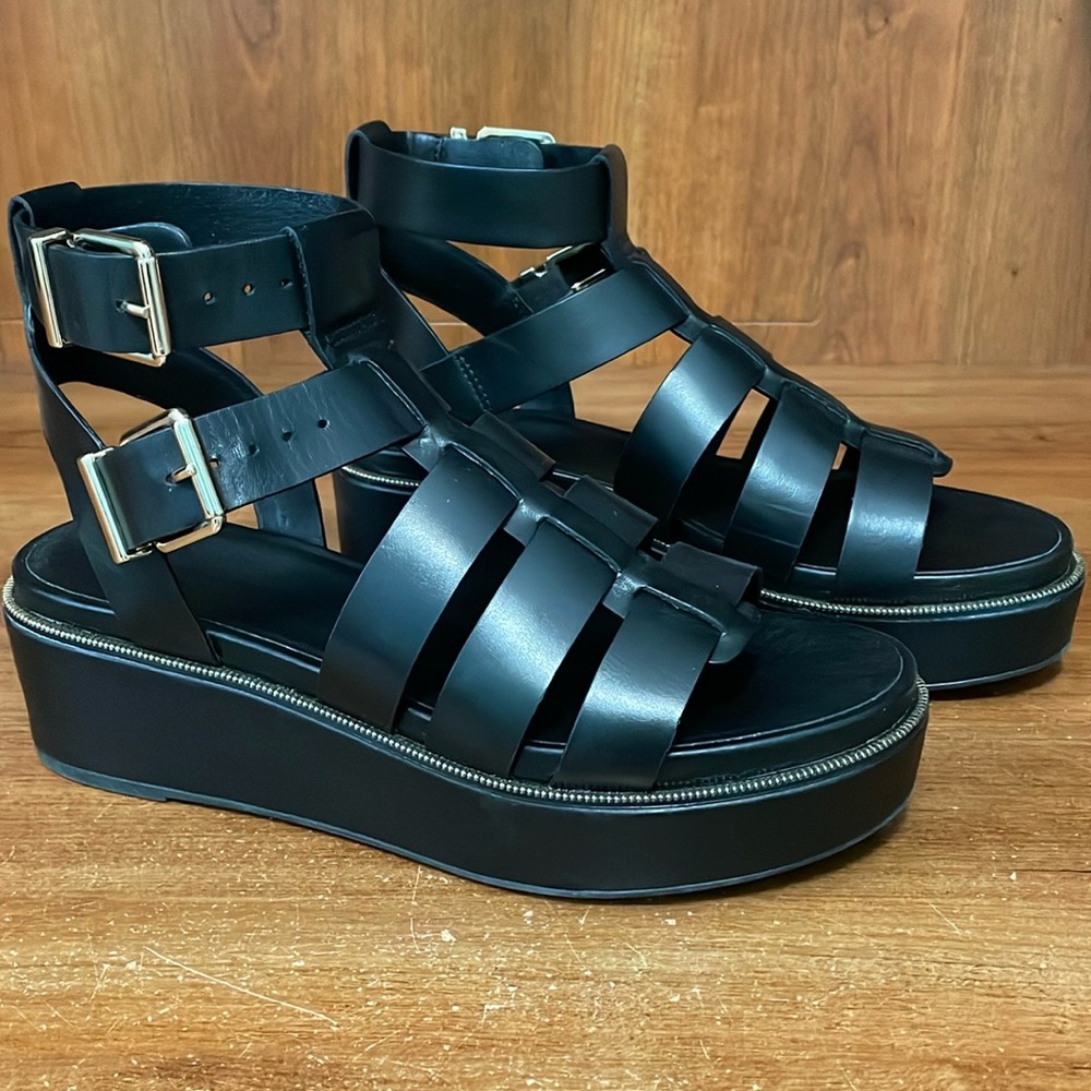 Black, platform, gladiator sandal. Gianni Bini size 8